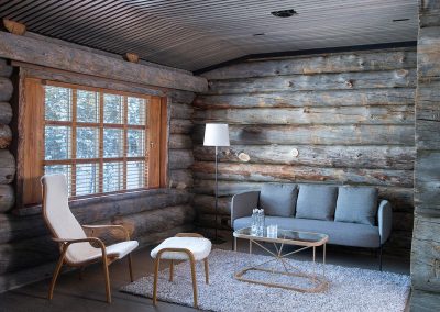 Presidential Suites feature lounge area and original log walls.