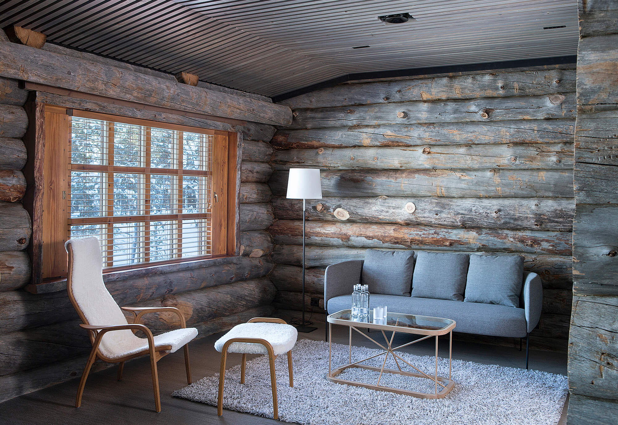 Presidential Suites feature lounge area and original log walls.
