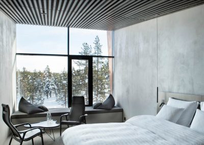 Accommodation in scandi chic rooms and suites – a scenery from one of our SkyView Suites.